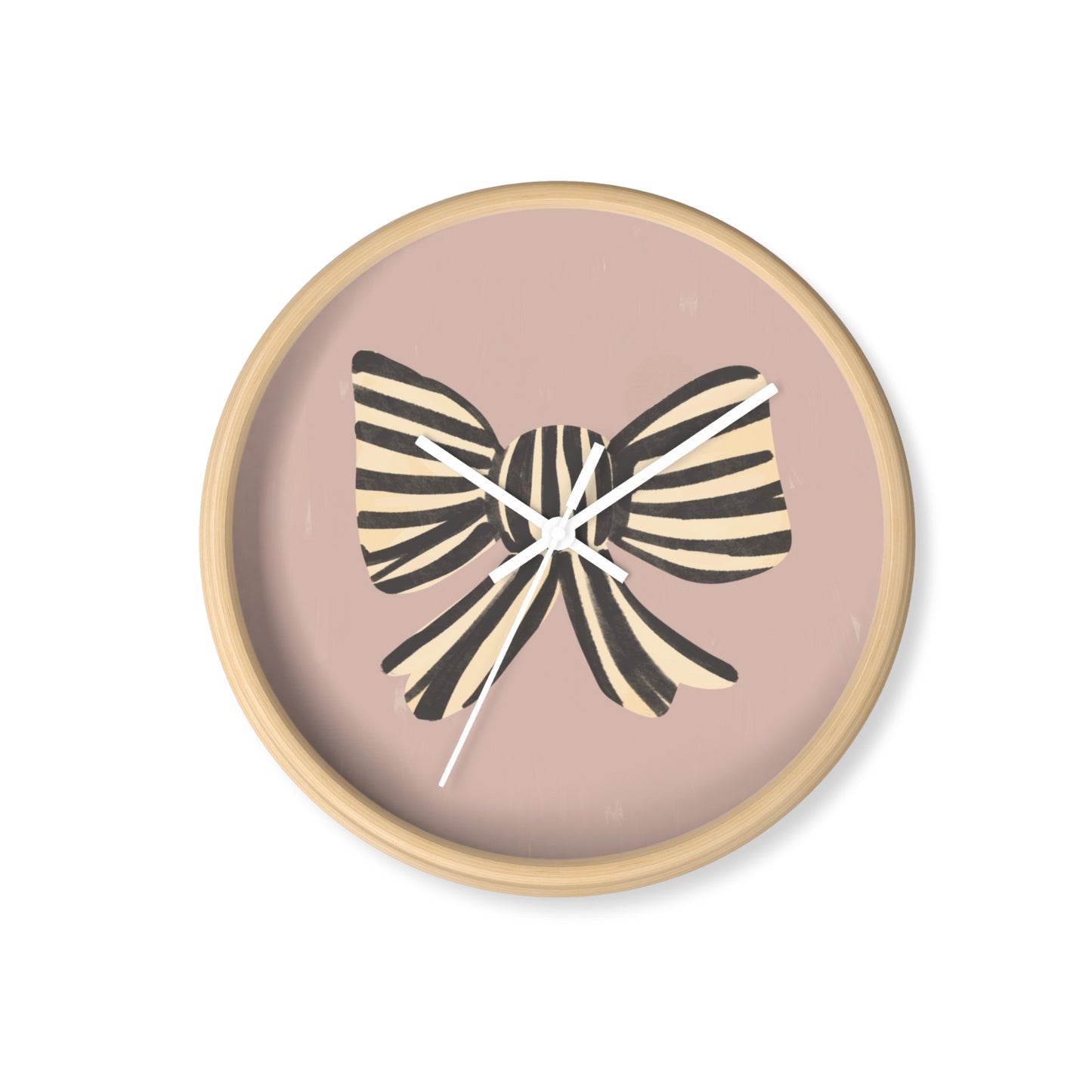 Round bamboo nursery wall clock with hand-painted striped black and cream bow on a muted pink background and white clock hands