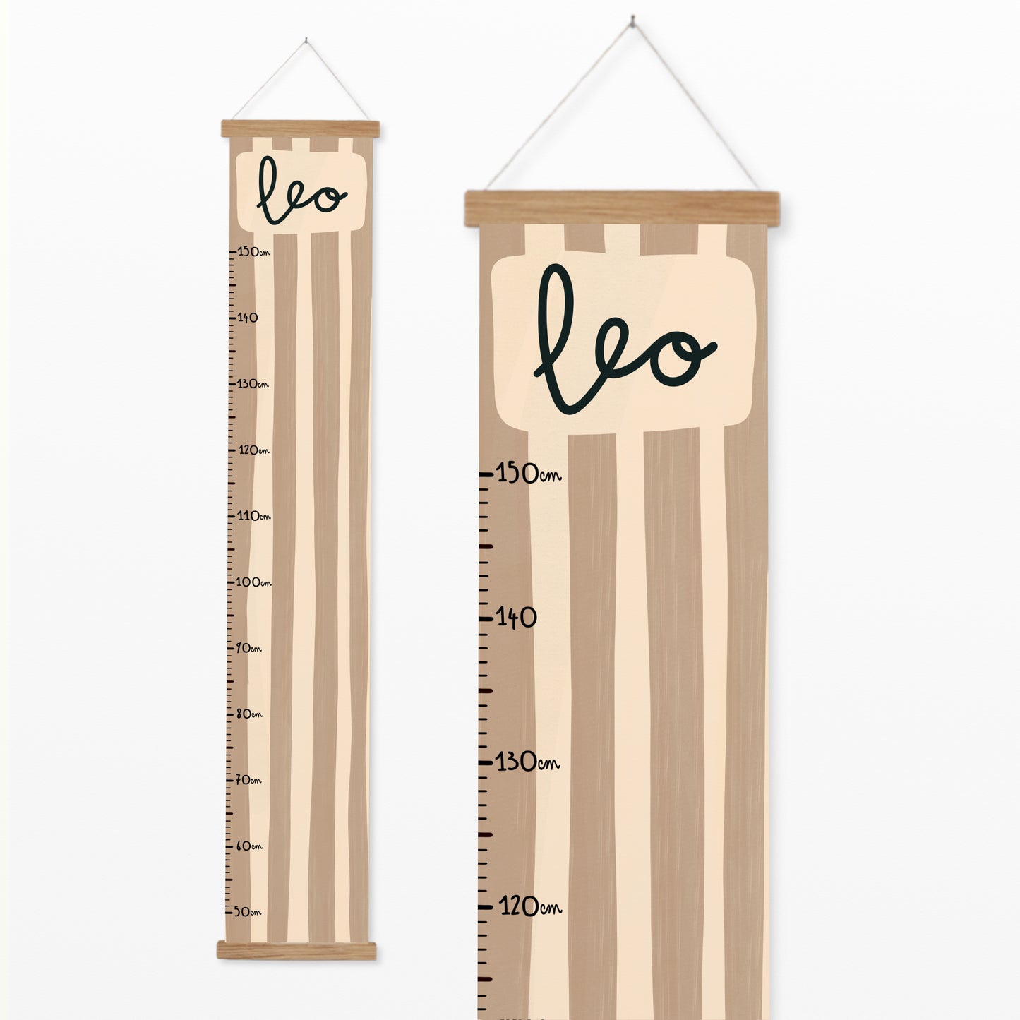 Personalised canvas height chart featuring hand-painted blush and taupe stripes with a name at the top and measurement markings from 50 cm to 150 cm.